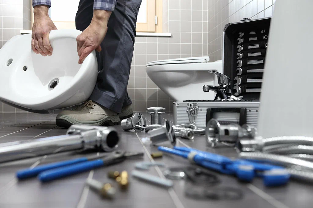 Plumbing tools prepared for a bathroom repair in Colton